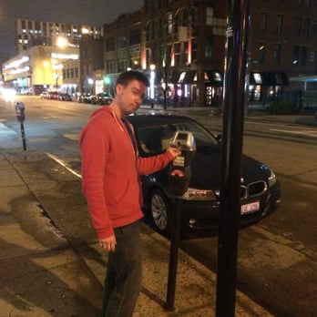 The Walrus - Shane, the manager putting additional money in the meter. This place Rocks!! - Bars Near Me - Columbus, Ohio