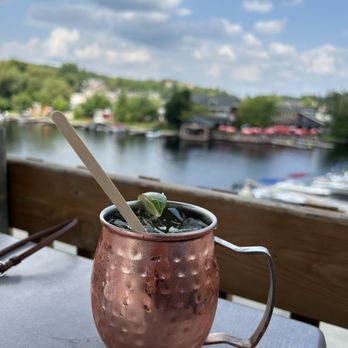On the Docks - a copper mug with a spoon in it - Pubs Near Me - Huntsville, Ontario On the Docks - a copper mug with a spoon in it - Pubs Near Me - Huntsville, Ontario