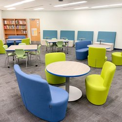 Create Spaces - Colorful, flexible seating and student tables at Clark County Library, education and public sector project by Create Spaces.