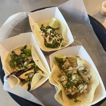 Rusty Taco - Brisket taco on top Fish taco on left Truffle chicken taco on right - Tacos Near Me - Atlanta, Georgia Rusty Taco - Brisket taco on top Fish taco on left Truffle chicken taco on right - Tacos Near Me - Atlanta, Georgia