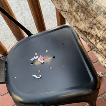 The Pizza Barn - Food and trash on table and chairs - Pizza Near Me - Kernville, California