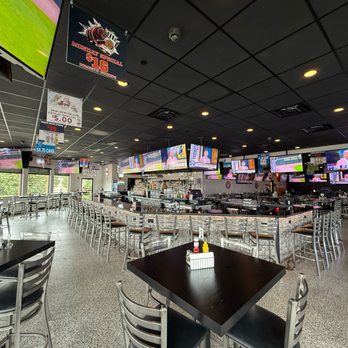 R Bar & Grill - Spacious seating, a full bar and 50 TVs throughout--there's not a bad seat in the house at R Bar! - Sports Bars Near Me - Saint John, Indiana R Bar & Grill - Spacious seating, a full bar and 50 TVs throughout--there's not a bad seat in the house at R Bar! - Sports Bars Near Me - Saint John, Indiana