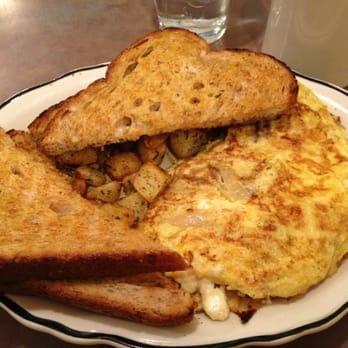 Snap's Restaurant - Sausage, carmelized onions & feta cheese omelette served with home fries and wheat berry (??) toast - Breakfast & Brunch Near Me - Bristol, Vermont