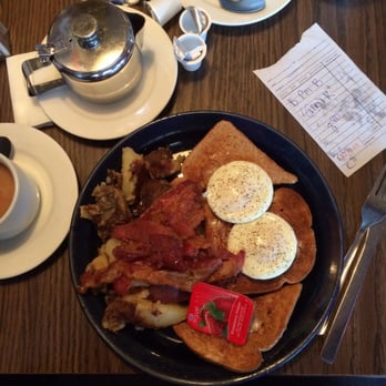 Bon's Off Broadway - My $2.95 breakfast special: Perfect poached eggs, bacon good quality but a bit dry, tea sub par, potatoes ok, satisfied overall. - Breakfast & Brunch Near Me - Vancouver, British Columbia