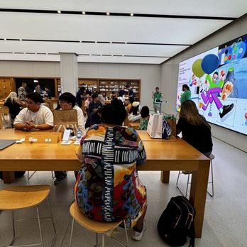 Apple Brea Mall - Back video wall and the setup/genius bar tables. - Mobile Phones Near Me - Brea, California Apple Brea Mall - Back video wall and the setup/genius bar tables. - Mobile Phones Near Me - Brea, California