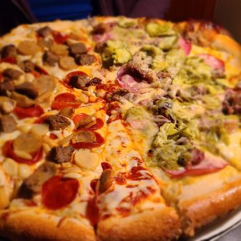 Dewey's Pizza - a close up of a pizza - Pizza Near Me - Crestview Hills, Kentucky