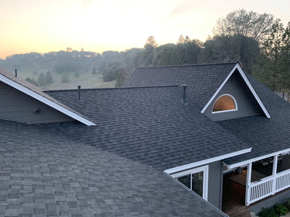 Slide of JMK Roofing