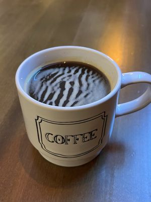 Black Milk Coffee and Crepe by null