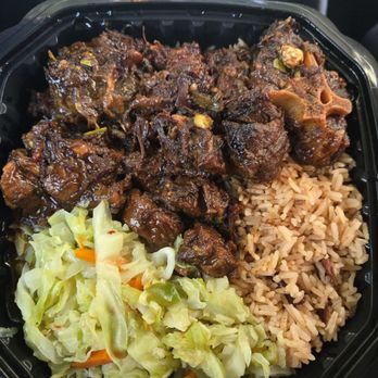 Ziggels Cuisine - Oxtail with Rice & beans and sautéed cabbage - Food Trucks Near Me Ziggels Cuisine - Oxtail with Rice & beans and sautéed cabbage - Food Trucks Near Me