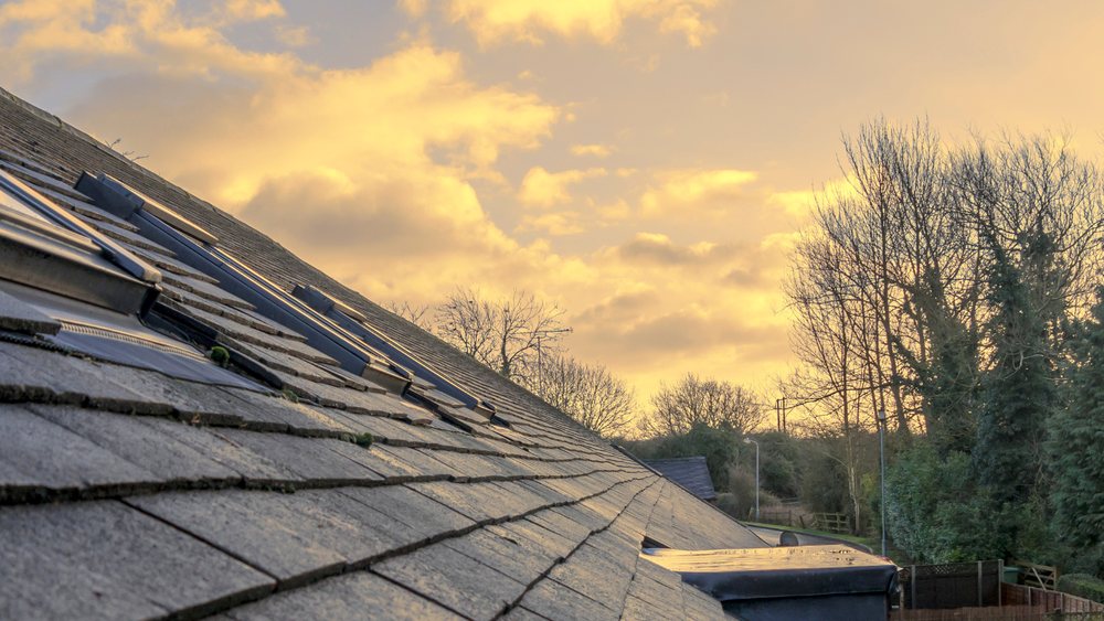 Slide of Sigma Roofing