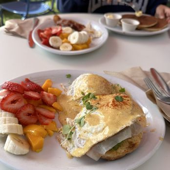 Nectarine Grove - Eggs Benedict with sub fruit - New American Near Me - Encinitas, California Nectarine Grove - Eggs Benedict with sub fruit - New American Near Me - Encinitas, California