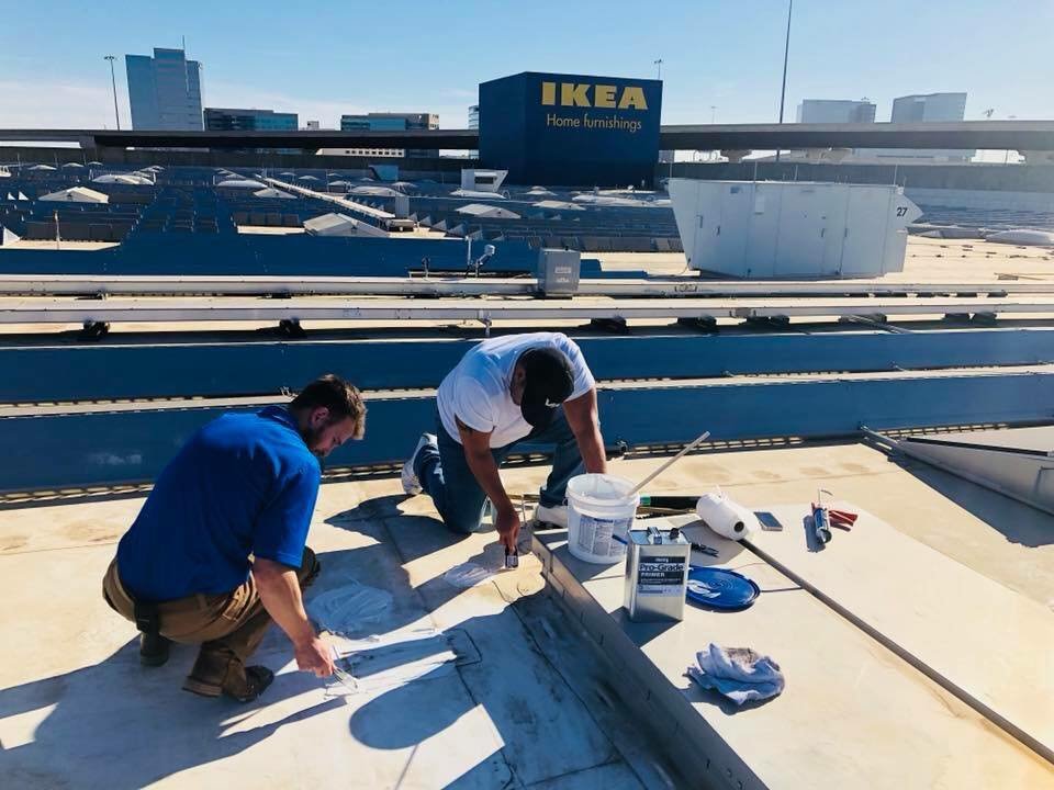 Slide of Striker Roofing & Construction