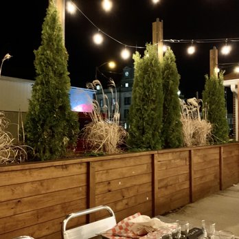 Civilian Brewing Corps - Part of the lovely patio with a view of the courthouse - Brewpubs Near Me - Spencer, Indiana Civilian Brewing Corps - Part of the lovely patio with a view of the courthouse - Brewpubs Near Me - Spencer, Indiana