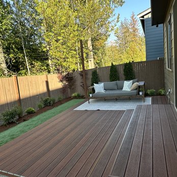 Maci Landscaping Services - a patio with a couch - Landscaping Near Me