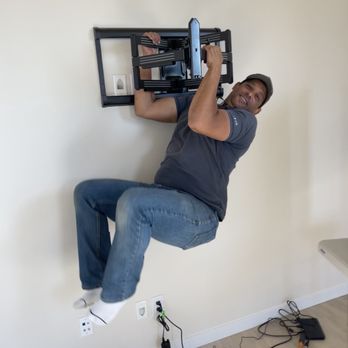 First Choice Custom Installations - WTF, the pic that helped me decide if Vince was right for the job, prior to this he did 5 pull-ups, yes the tv is still intact on the wall - Security Systems Near Me First Choice Custom Installations - WTF, the pic that helped me decide if Vince was right for the job, prior to this he did 5 pull-ups, yes the tv is still intact on the wall - Security Systems Near Me