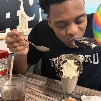 Elm Street Diner - My son enjoying the chocolate Cafe Cocoa Milkshake! - Diners Near Me - Stamford, Connecticut