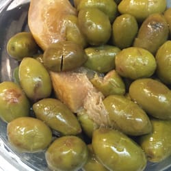 Green olives with preserved lemon. Very authentic and great for mezze