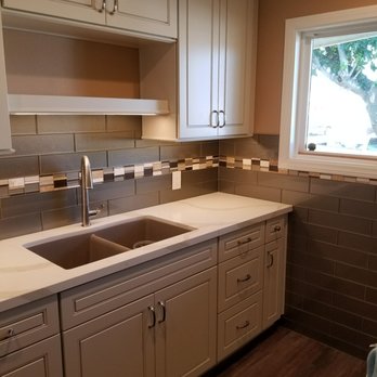 Coley Construction - a kitchen with a sink and a window - General Contractors Near Me Coley Construction - a kitchen with a sink and a window - General Contractors Near Me