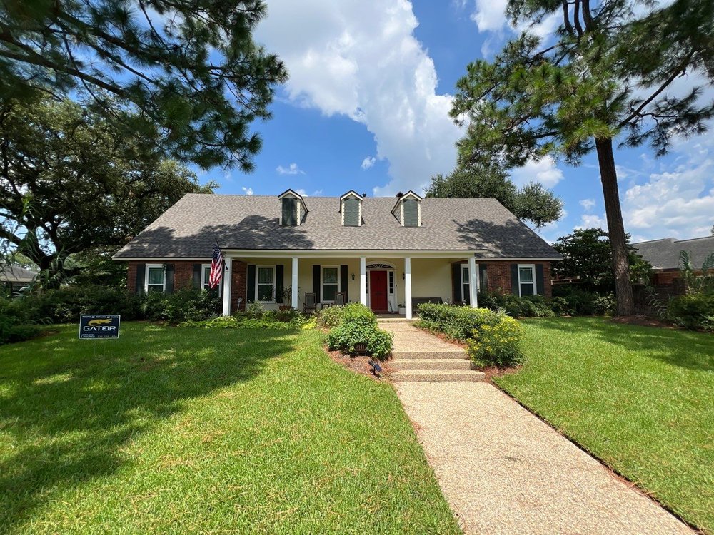 Slide of Gator Roofing and Restoration