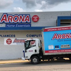Arona Home Essentials Cedar Rapids - Store front and delivery truck