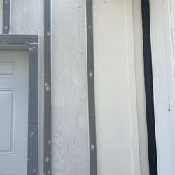American Gutters - Outside siding repair after