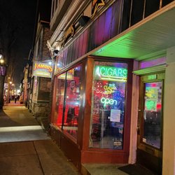 Famous Smoke Shop/ Full Liquor Cigar BAR