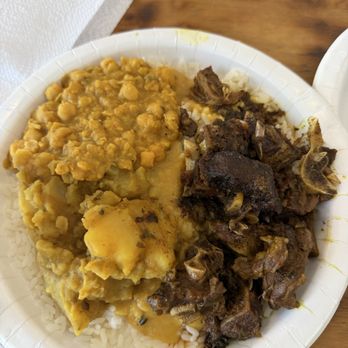 Pepper's Island - Curry Goat plate with rice, potato and Chana - Trinidadian Near Me - Tampa, Florida