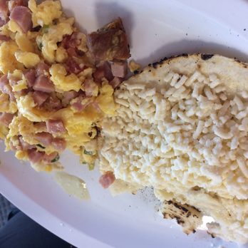 La Casa del PanDeBono - Scramble eggs with ham. And tasteless arepa and cheese - Bakeries Near Me - Orlando, Florida La Casa del PanDeBono - Scramble eggs with ham. And tasteless arepa and cheese - Bakeries Near Me - Orlando, Florida