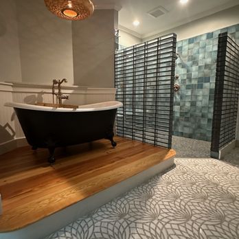 Restore Pros - Master bathroom refresh with unique tile floor, a bold shower, a cast iron soaking tub with a Moroccan Chandelier - General Contractors Near Me - Hull, Georgia Restore Pros - Master bathroom refresh with unique tile floor, a bold shower, a cast iron soaking tub with a Moroccan Chandelier - General Contractors Near Me - Hull, Georgia