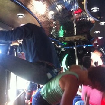 ATX Party Bus - Many handles / rails means many ways to work it... We were cruising down the highway when this was taken. - Party Bus Rentals Near Me - Austin, Texas