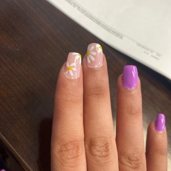 Midtown Nail Spa - Day 1 already seems weird at bottom of index / middle finger especially. Not coffin shape. A lady did flower design, I loved it - Nail Salons Near Me - Raleigh, North Carolina