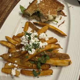 Kotopoulo Sandwich with fries (half eaten because I was starving) Kotopoulo Sandwich with fries (half eaten because I was starving)