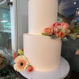 Gorgeous baby shower cake! They will match pretty much any color for you in the butter cream frosting. Soooo good!