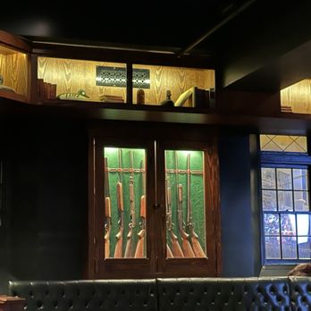 The Hunt Room - Gun case in dining room - Cocktail Bars Near Me - Virginia Beach, Virginia The Hunt Room - Gun case in dining room - Cocktail Bars Near Me - Virginia Beach, Virginia