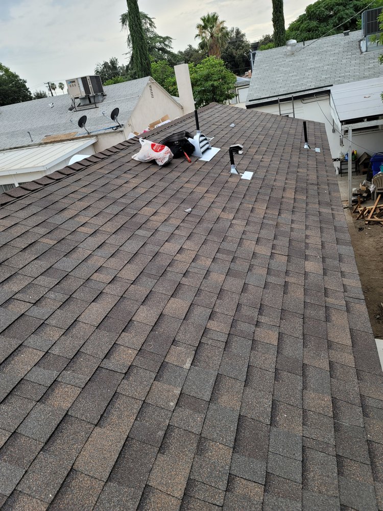 Slide of Eminent Roofing