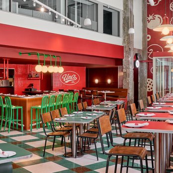 Unc's Pizza - Inside Unc's Pizza in downtown Detroit, with colorful retro-inspired details, booth seating, tables and bar seating. - Pizza Near Me - Detroit, Michigan Unc's Pizza - Inside Unc's Pizza in downtown Detroit, with colorful retro-inspired details, booth seating, tables and bar seating. - Pizza Near Me - Detroit, Michigan