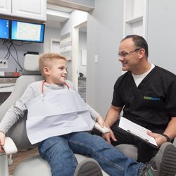McKinley Crossing Dental - Dr Bartos and a young patient