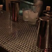 Photo of Little Branch - New York, NY, United States. Bartender making our drinks at the bar