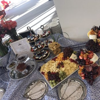 Q Caterers - Imported and Local Cheese Display accompanied by crackers and baguettes presented with fresh and dried fruit - Caterers Near Me - Hyattsville, Maryland Q Caterers - Imported and Local Cheese Display accompanied by crackers and baguettes presented with fresh and dried fruit - Caterers Near Me - Hyattsville, Maryland
