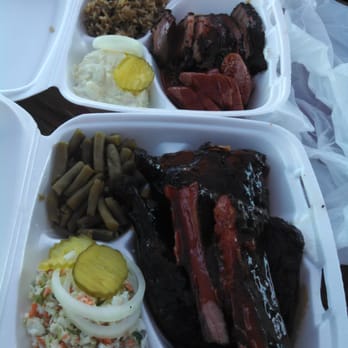 Fitties BBQ - Two 2-meat plates so we can try brisket, sausage, chicken, ribs, cole slaw, dirty rice, green beans, and potato salad...YUM. - Barbeque Near Me - Bastrop, Texas Fitties BBQ - Two 2-meat plates so we can try brisket, sausage, chicken, ribs, cole slaw, dirty rice, green beans, and potato salad...YUM. - Barbeque Near Me - Bastrop, Texas