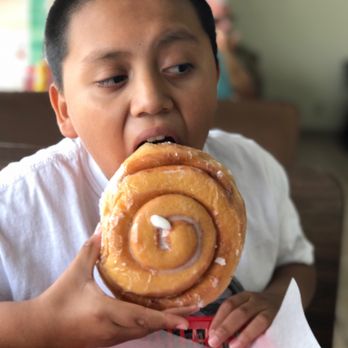 Sip & Dip - Yes, that coffee roll is the size of an 11 year olds head! - Donuts Near Me - Saint Cloud, Florida