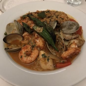 Elizabeth On 37th - Their spicy red rice with fish, shrimp, clams and seared okra. - New American Near Me - Savannah, Georgia Elizabeth On 37th - Their spicy red rice with fish, shrimp, clams and seared okra. - New American Near Me - Savannah, Georgia