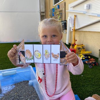 Lovely Bees Child Care - Showing how proud she is of her work. - Child Care & Day Care Near Me - Thousand Oaks, California