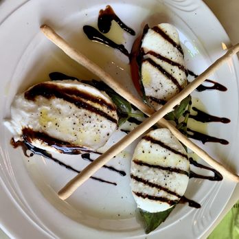 Johnny’s Torch Riviera - Mozzarella Caprese - Pizza Near Me - Rapid City, Michigan Johnny’s Torch Riviera - Mozzarella Caprese - Pizza Near Me - Rapid City, Michigan