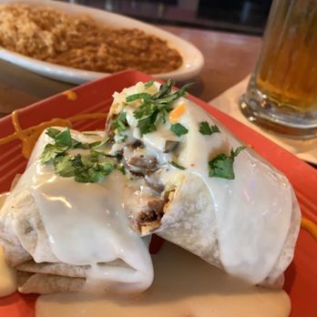 Chulas Mexican Grill - California burrito server with rice and beans - Mexican Near Me - Spring Hill, Florida Chulas Mexican Grill - California burrito server with rice and beans - Mexican Near Me - Spring Hill, Florida