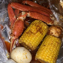 1/2 LB Snow Crab Legs added Corn on the Cob and two Boiled Eggs