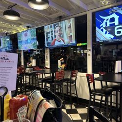 DC Pub and Grill - Inside DC Pub and Grill. Lots of tvs and thumping music