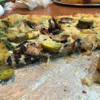 Mellow Mushroom - I'm half way eating this tasty pizza! - Pizza Near Me - Fort Worth, Texas Mellow Mushroom - I'm half way eating this tasty pizza! - Pizza Near Me - Fort Worth, Texas