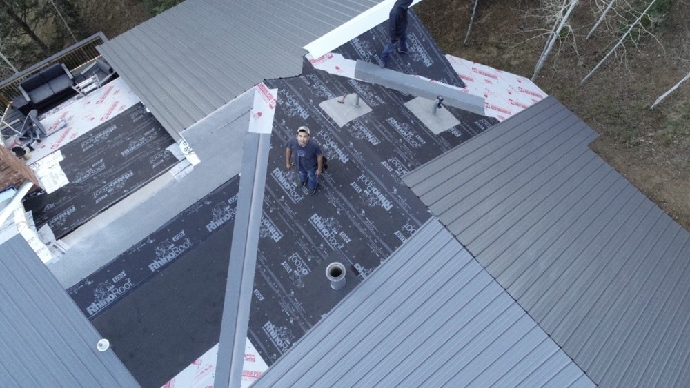 Slide of Masters Roofing & Construction