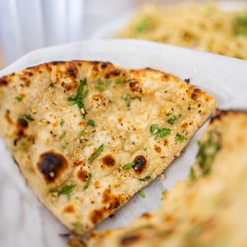 Dawaat Indian Cuisine - Garlic Naan ($2.99) - Indian Near Me - San Jose, California Dawaat Indian Cuisine - Garlic Naan ($2.99) - Indian Near Me - San Jose, California